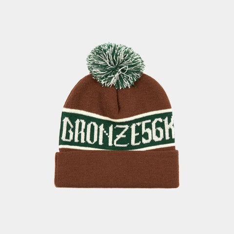BRONZE 56K POOF BALL BEANIE - BROWN